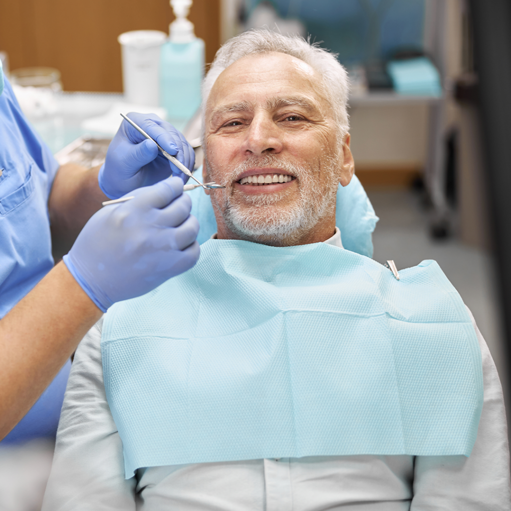 grown man in dentist appointment